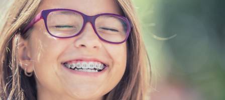 Happy Smiling teenage girl with braces